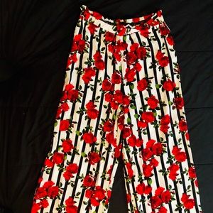 Rose covered palazzo pants with stripes